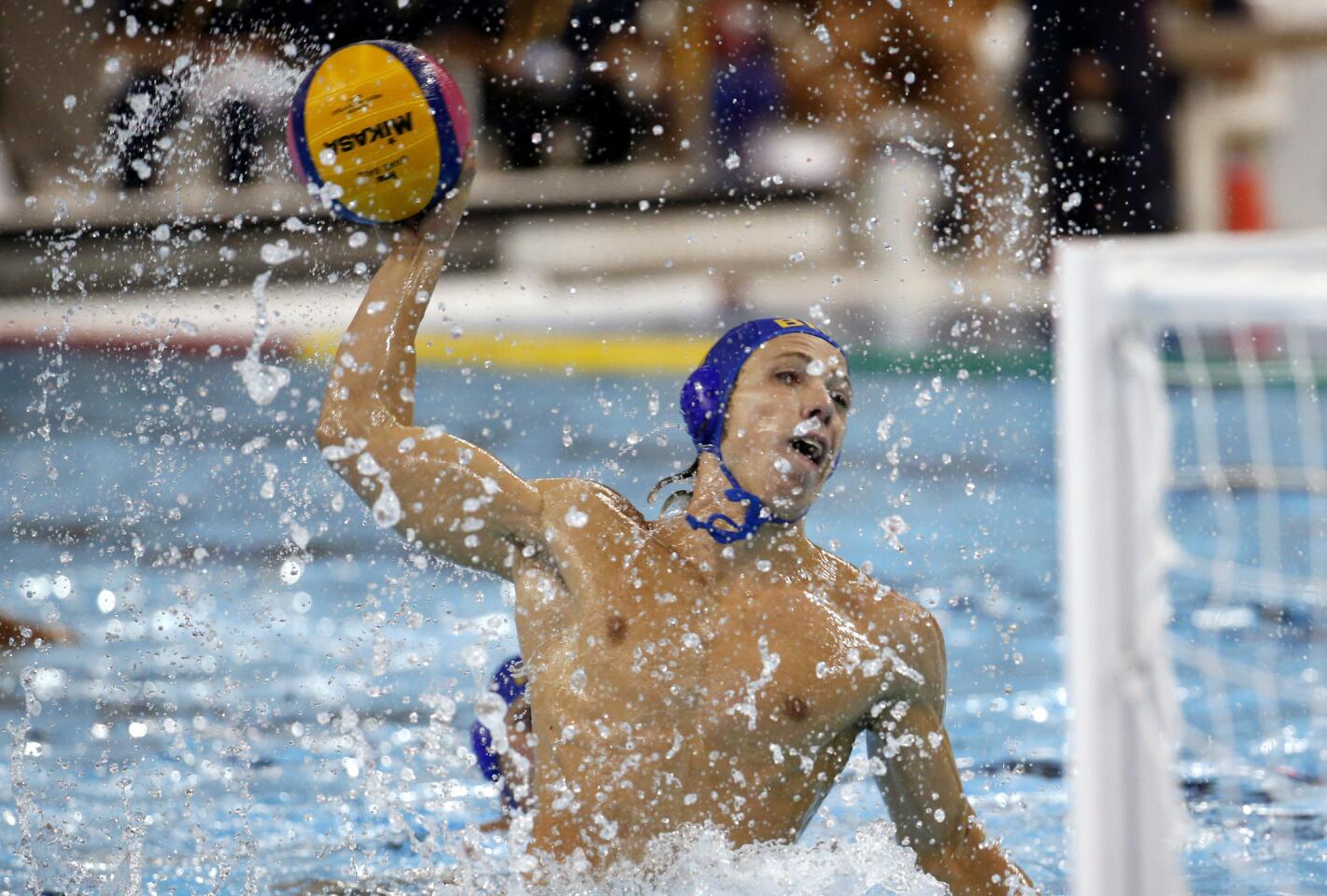 Brazil's Adrian Delgado Baches shoots a penalty against the United States during the second half of the men's water polo gold medal match at the Pan Am Games, Wednesday, July 15, 2015, in Markham, Ontario. The U.S. won 11-9. (AP Photo/Julio Cortez) ORG XMIT: CAJXC181