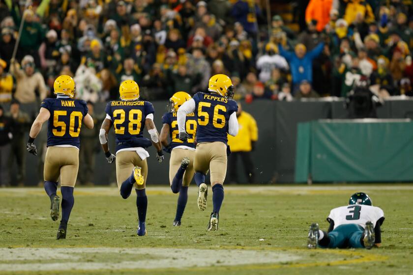 GREEN BAY, WI - NOVEMBER 16: Casey Hayward #29 of the Green Bay Packers runs a fumble by quarterback Mark Sanchez #3 of the Philadelphia Eagles for a touchdown during the fourth quarter of the game at Lambeau Field on November 16, 2014 in Green Bay, Wisconsin. (Photo by Mike Zarrilli/Getty Images)