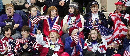 American fans cheer for the United States in the Men's bronze medal curling match against Great Britain.