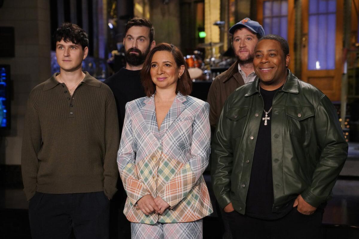 Maya Rudolph with Vampire Weekend and Kenan Thompson.