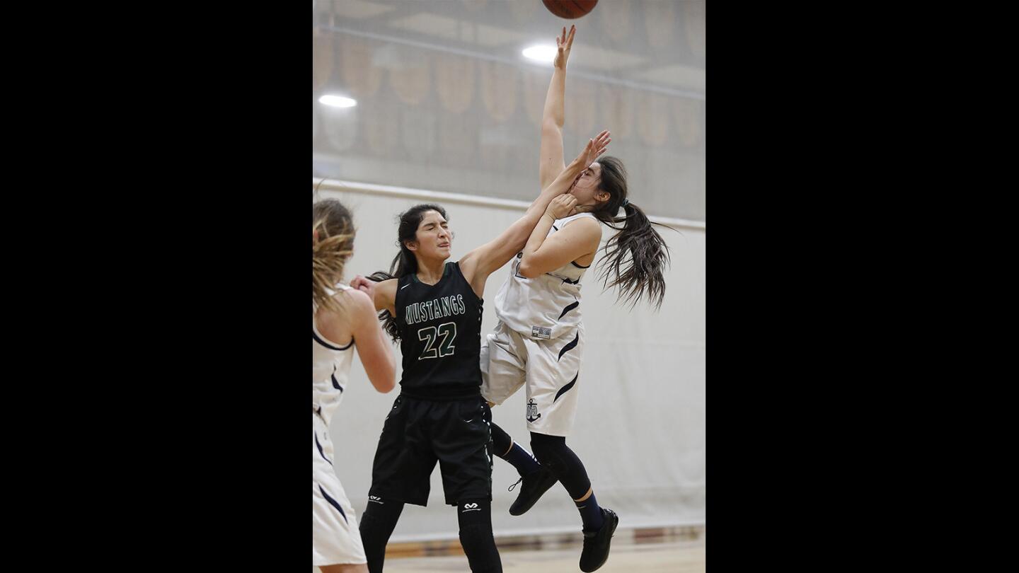 Photo Gallery: Newport Harbor vs. Costa Mesa in a girls' basketball game