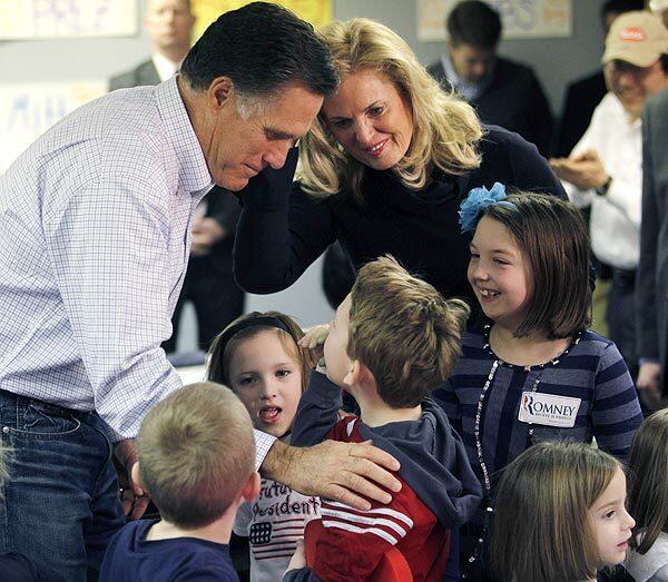 Romney greets children