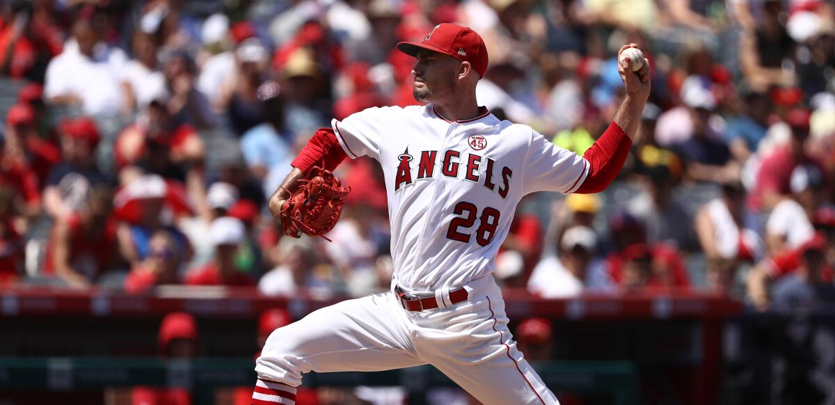 Angels starter Andrew Heaney delivers during the first inning against the Boston Red Sox on Sunday.