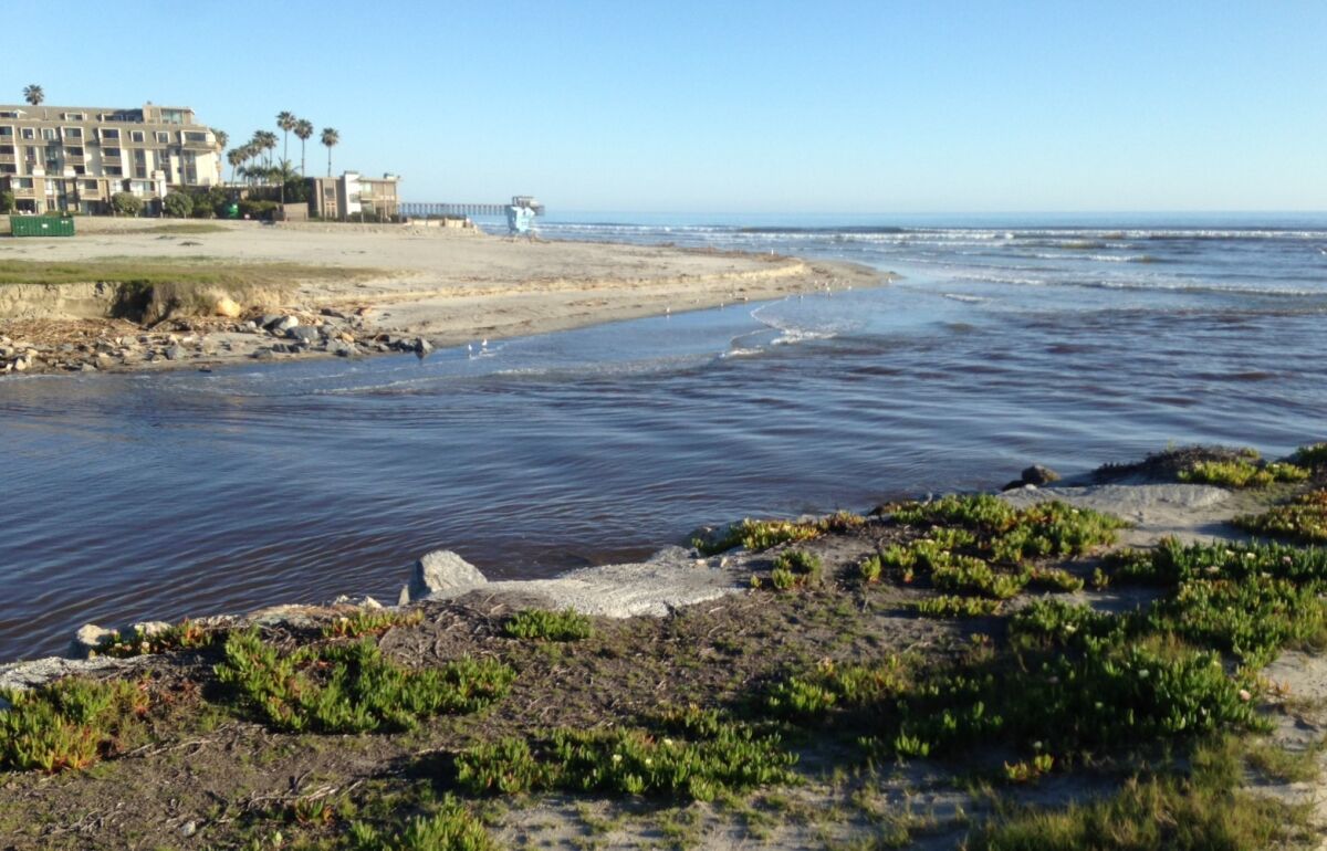 The San Luis Rey River remained high Wednesday after last week's storms.