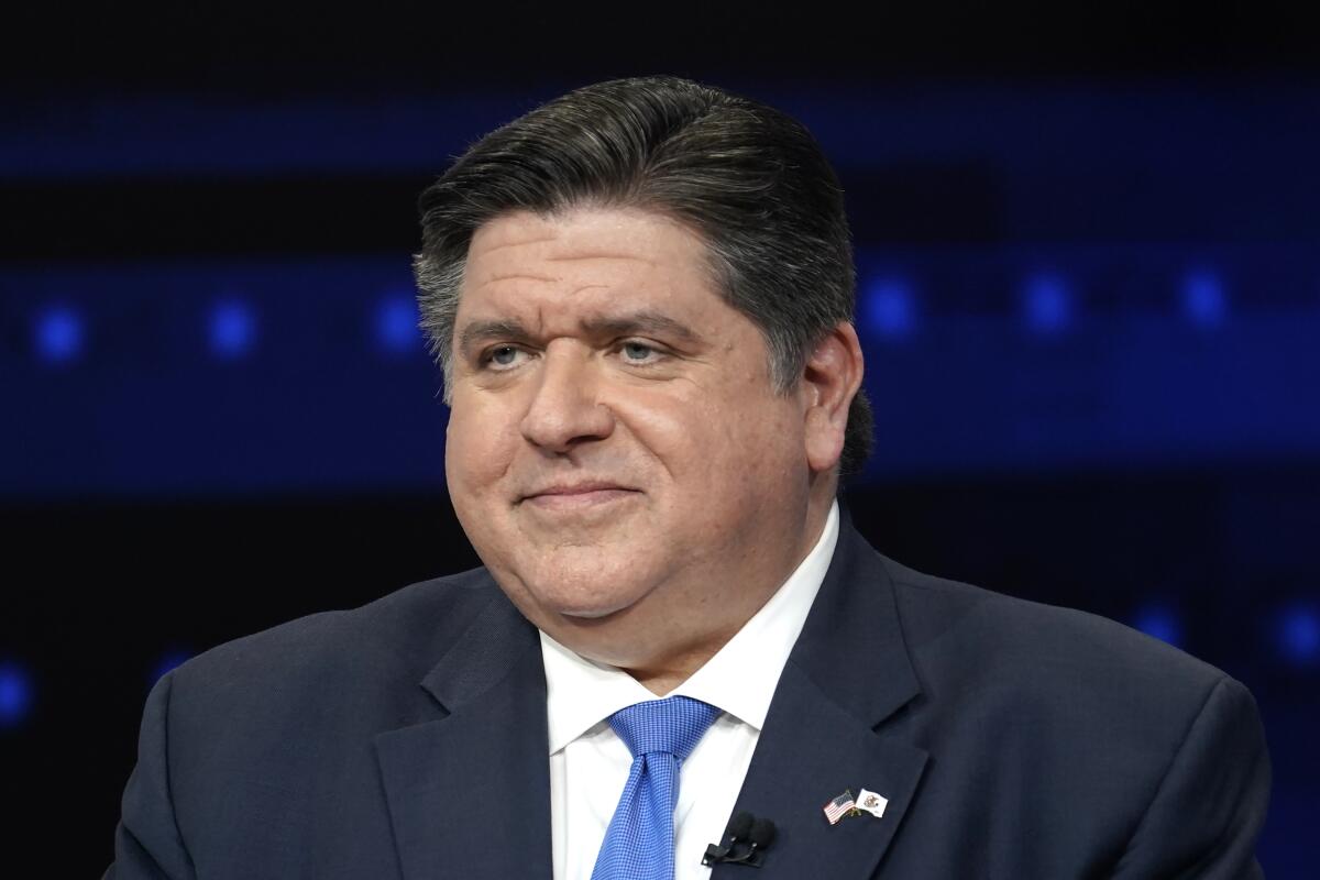 FILE - Illinois Gov. JB Pritzker participates in a debate with Republican gubernatorial challenger state Sen. Darren Bailey at the WGN9 studios, Tuesday, Oct. 18, 2022, in Chicago. (AP Photo/Charles Rex Arbogast, File)