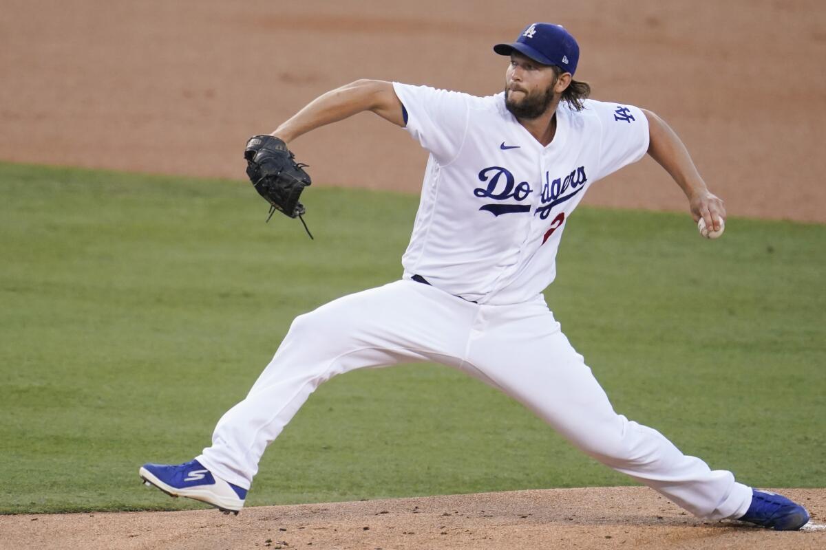 Los Angeles Dodgers starting pitcher Clayton Kershaw throws to an Arizona Diamondbacks.