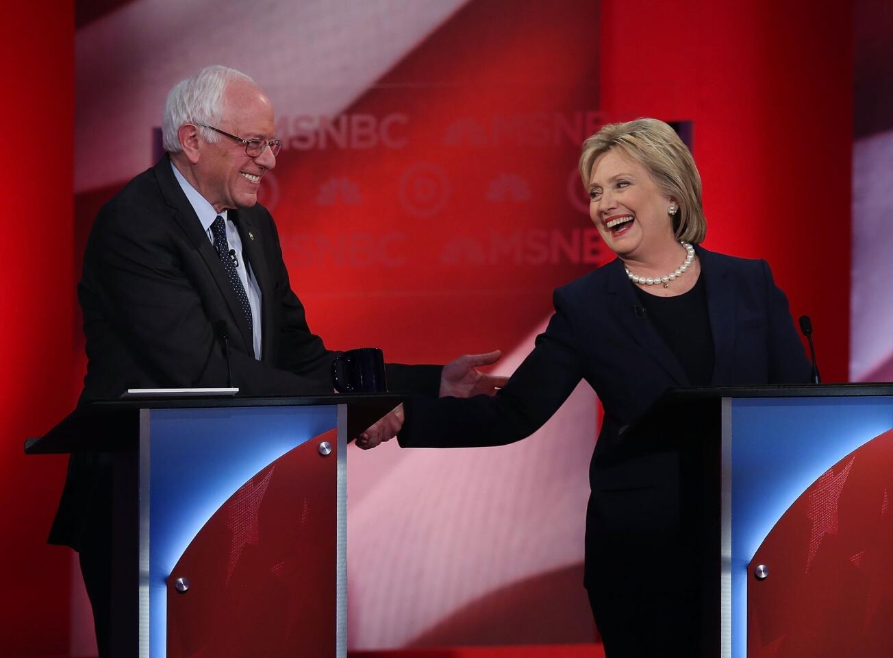 Bernie Sanders and Hillary Clinton shake hands after the debate.