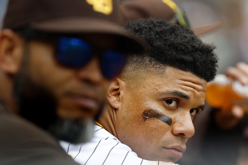 San Diego CA - May 17: San Diego Padres' Juan Soto looks on from the dugout during a game against the Kansas City Royals at Petco Park on Wednesday, May 17, 2023. (K.C. Alfred / The San Diego Union-Tribune)