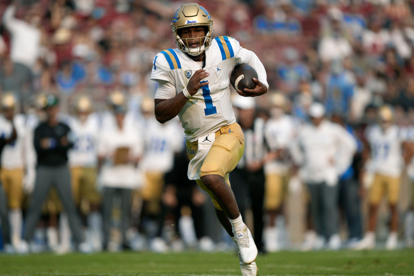 UCLA quarterback Dorian Thompson-Robinson runs for a two-yard, second-quarter touchdown against Stanford on Sept. 25, 2021.