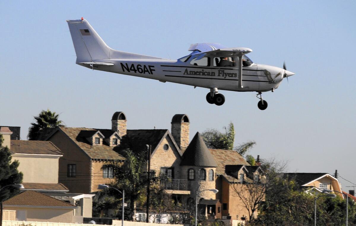 A plane lands at Santa Monica Airport. The Federal Aviation Administration ruled Friday that the embattled facility must stay open at least until 2023.