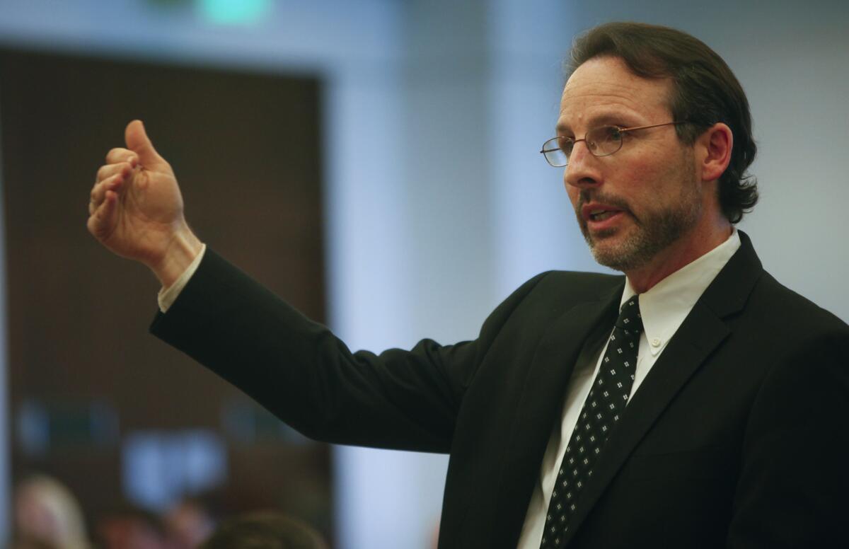 Assistant Public Defender Scott Sanders questions a witness during a hearing in Orange County Superior Court.