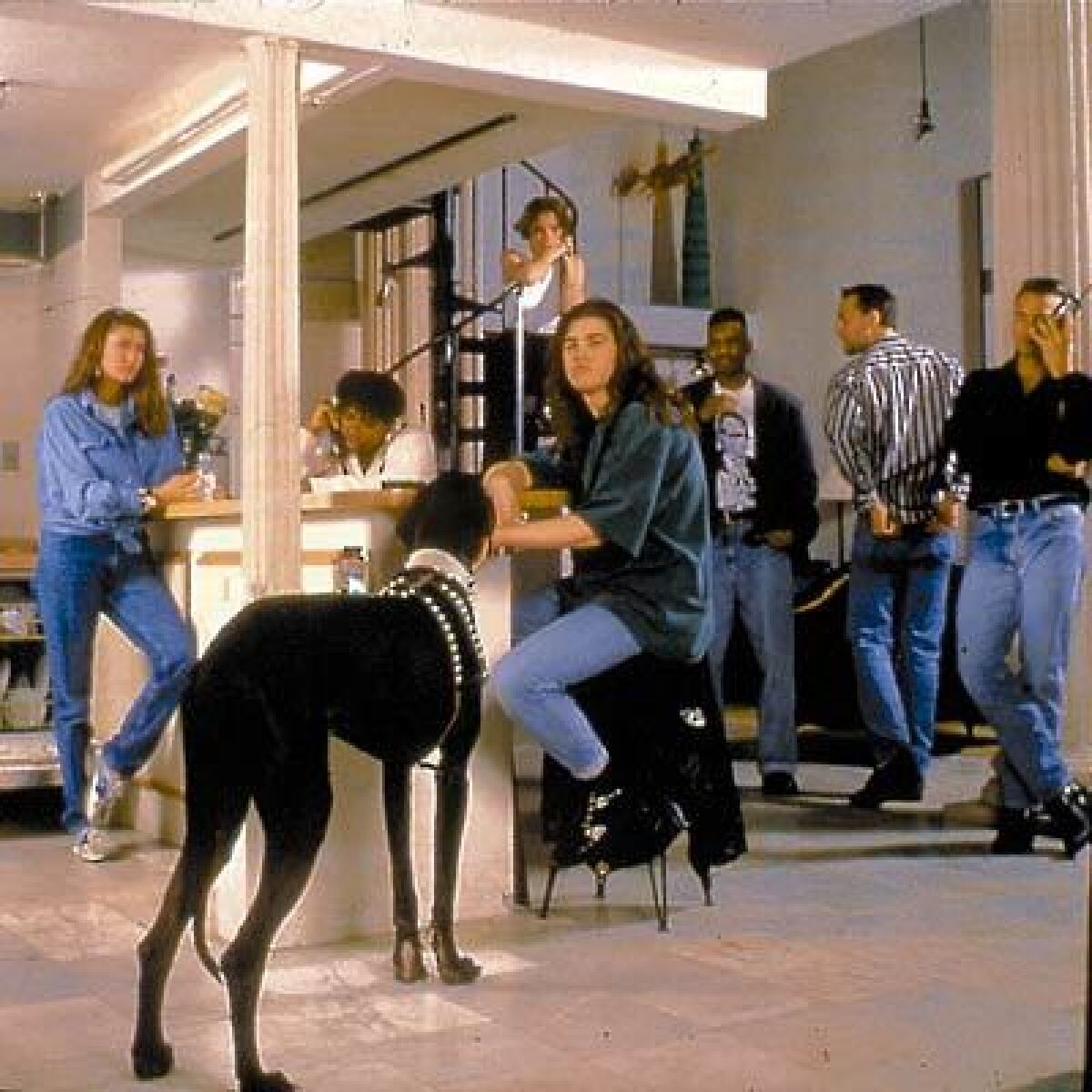 The cast of "The Real World" pictured in their loft in 1992