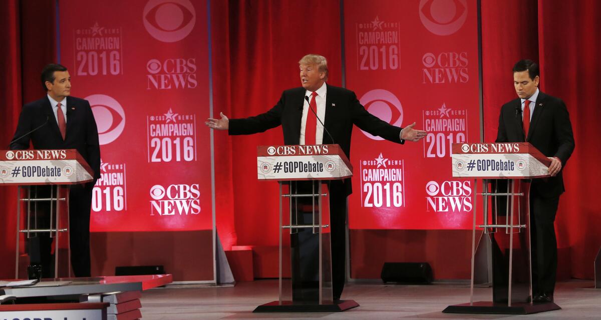 Donald Trump betweeen Sen. Ted Cruz, R-Texas, left, and Sen. Marco Rubio, R-Fla., right, during the CBS News Republican presidential debate at the Peace Center, Saturday, Feb. 13 in Greenville, S.C.