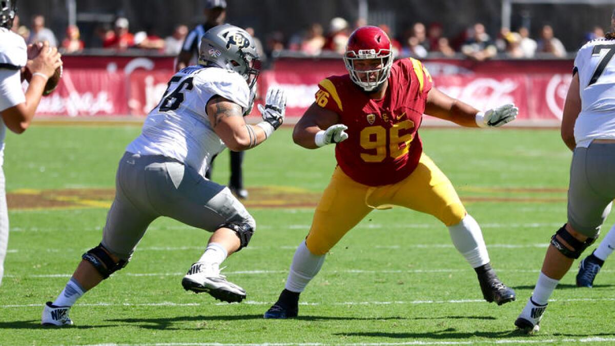 USC defensive tackle Stevie Tu'ikolovatu comes upfield on a pass rush against Colorado on Oct. 8.
