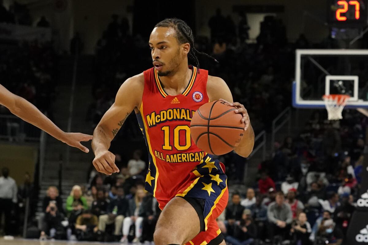 Amari Bailey dribbles while playing in the McDonald's All-American game.