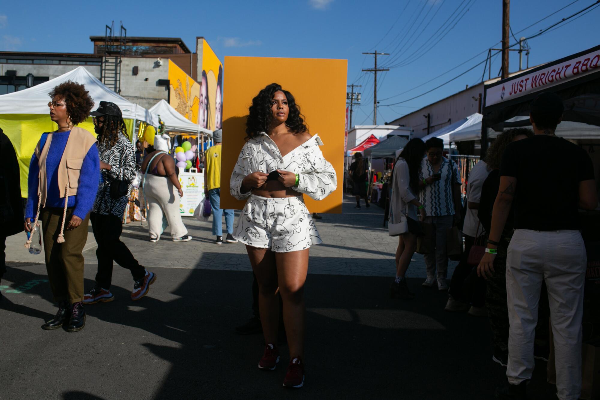 Porsha Huggins of Long Beach poses for a portrait while attending Black Market Flea held at The Beehive