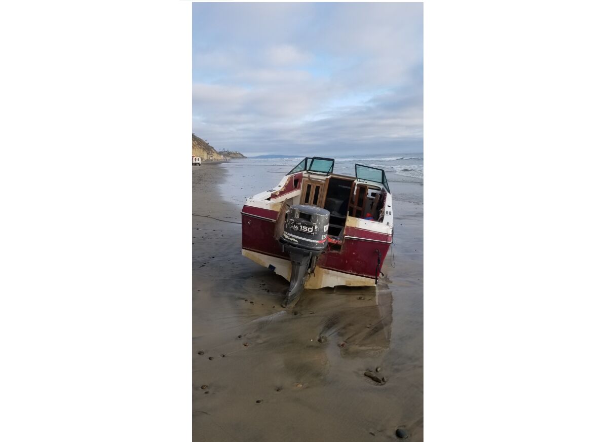 Empty boat sits on Beacon's Beach
