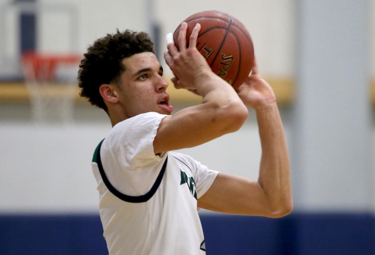 Lonzo Ball, seen here playing for Chino Hills High last season, averaged eight points in his first three exhibitions with UCLA, which were played in Australia.