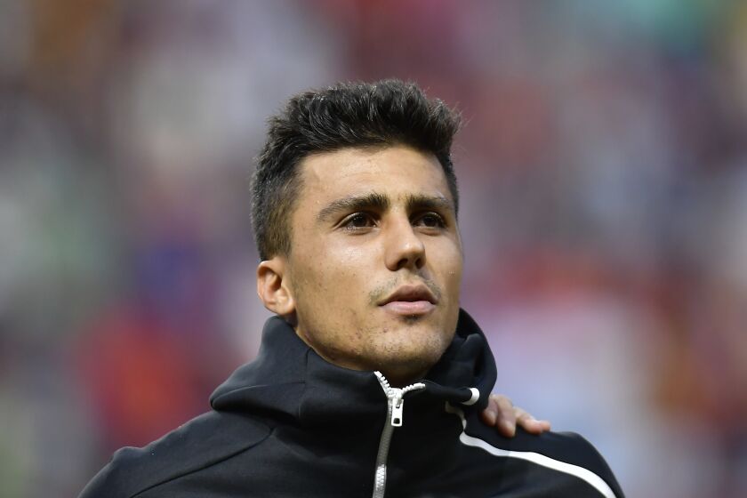 Spain's Rodri stands before the Euro 2020 group F qualifying soccer match between Spain and Faroe Islands at the Molinon stadium in Gijon, Spain, Sunday, Sept. 8, 2019. (AP Photo/Alvaro Barrientos)
