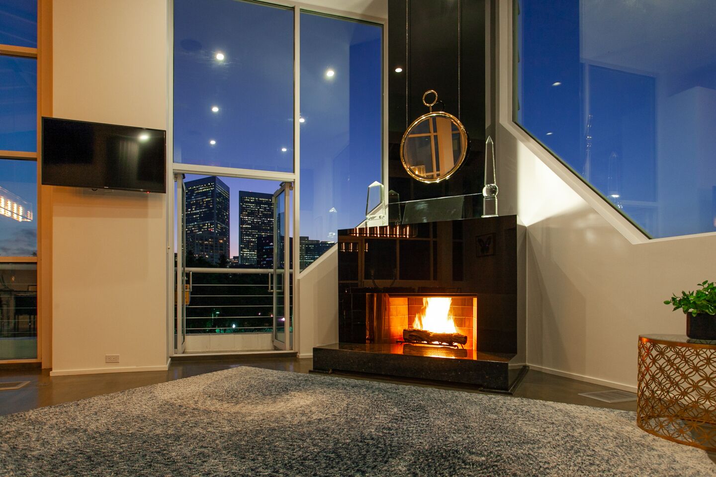 The penthouse has floor-to-ceiling windows, high ceilings and a wraparound terrace.