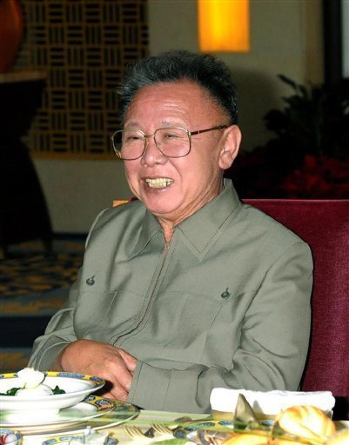 FILE - In this file photo taken during Kim Jong Il's recent visit to China and released by Korean Central News Agency via Korea News Service in Tokyo May 9, 2010, North Korean leader Kim Jong Il smiles during a meeting with Chinese President Hu Jintao in China. North Korea will hold its biggest political meeting in 30 years next week, state media reported Tuesday, Sept. 21, 2010 as observers watched for signs that the secretive regime's aging leader has chosen his son to succeed him. (AP Photo/Korean Central News Agency via Korea News Service)