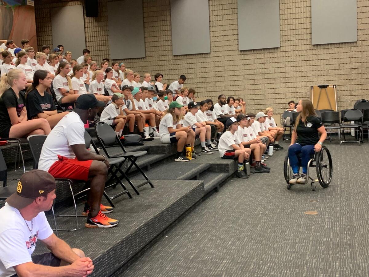 Sarah Bettencourt speaking to athletes.