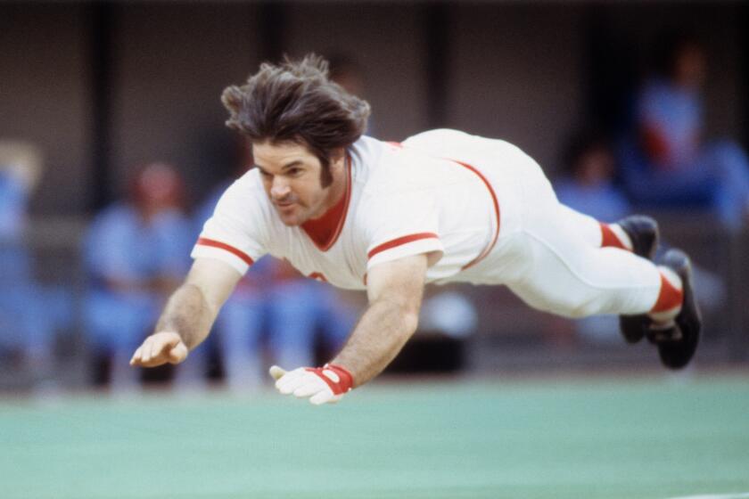 Baseball: Cincinnati Reds Pete Rose (14) in action, sliding sliding head first into homeplate.