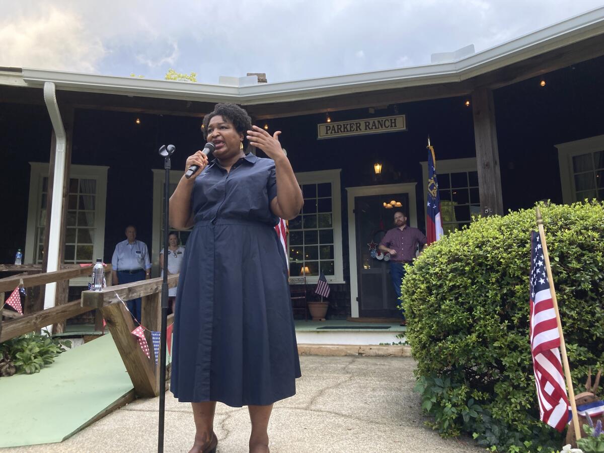 Georgia Democratic candidate for governor Stacey Abrams speaks on Thursday, July 28, 2022, during a rally in Clayton, Ga. (AP Photo/Jeff Amy)