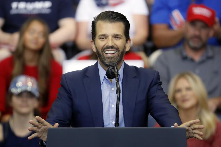 FILE - In this Aug. 1, 2019, file photo, Donald Trump Jr. speaks before the arrival of President Donald Trump at a campaign rally at U.S. Bank Arena in Cincinnati. (AP Photo/John Minchillo, File)