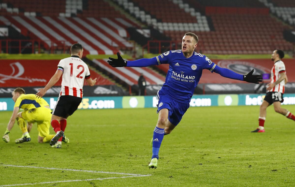Leicester's Jamie Vardy celebrates after scoring his side's second goal during the English Premier League soccer match between Sheffield United and Leicester City, at the Brammall Lane Stadium in Sheffield, England, Sunday, Dec. 6, 2020. (Jason Cairnduff, Pool via AP)