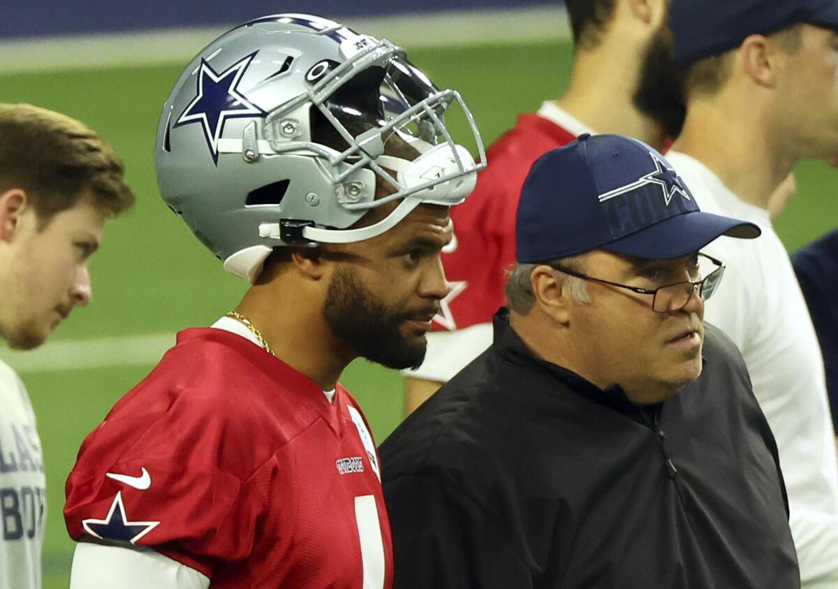 Cowboys' Prescott takes next step since injury as camp opens - The