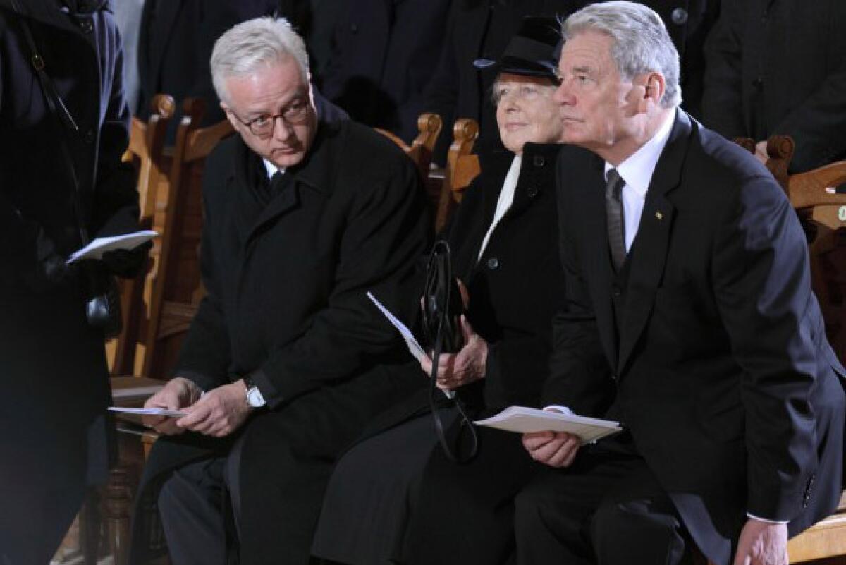 Fritz von Weizsaecker, left, attends the 2015 funeral of his father, former German President Richard von Weizsaecker, in Berlin. He is joined by his mother, Marianne von Weizsaecker, and then-German President Joachim Gauck.