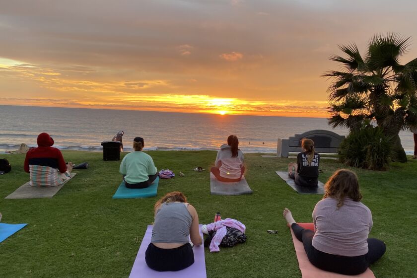 Participants in a PB Sunset Yoga class.