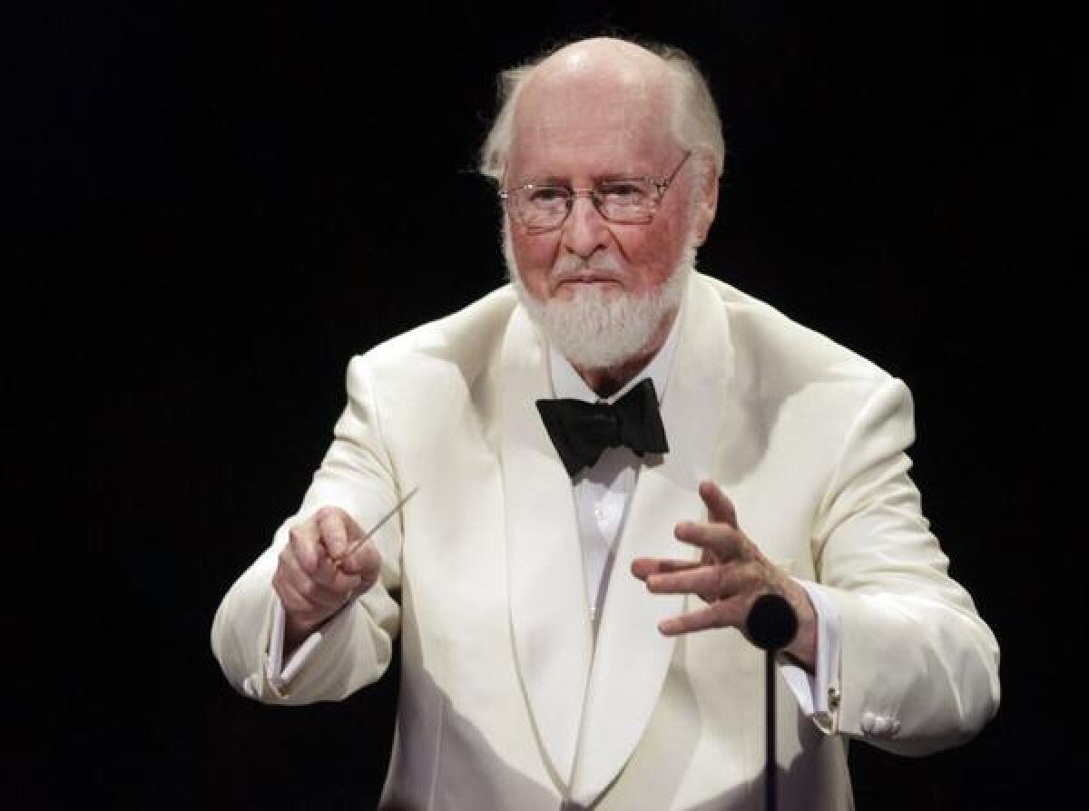 John Williams conducts the L.A. Philharmonic at the Hollywood Bowl in August. A piece by the Oscar-winning composer will have its world premiere at the Piano Sphere's season opener Tuesday.