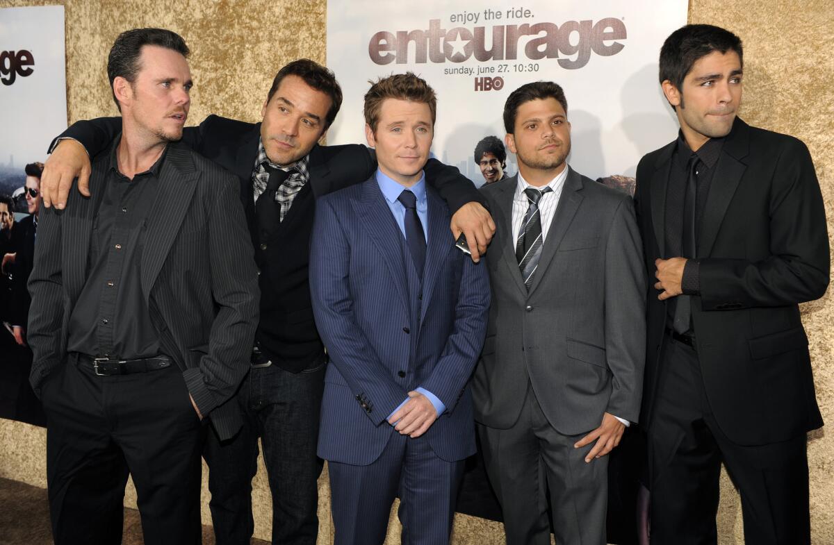 "Entourage" cast members, from left, Kevin Dillon, Jeremy Piven, Kevin Connolly, Jerry Ferrara and Adrian Grenier pose together at the premiere of the seventh season of the HBO series in Los Angeles.