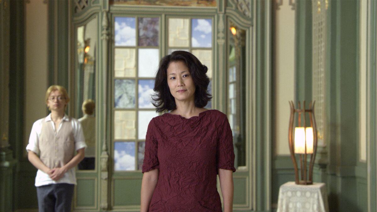 Jacqueline Kim as Gwen in "Advantageous" from 2015.