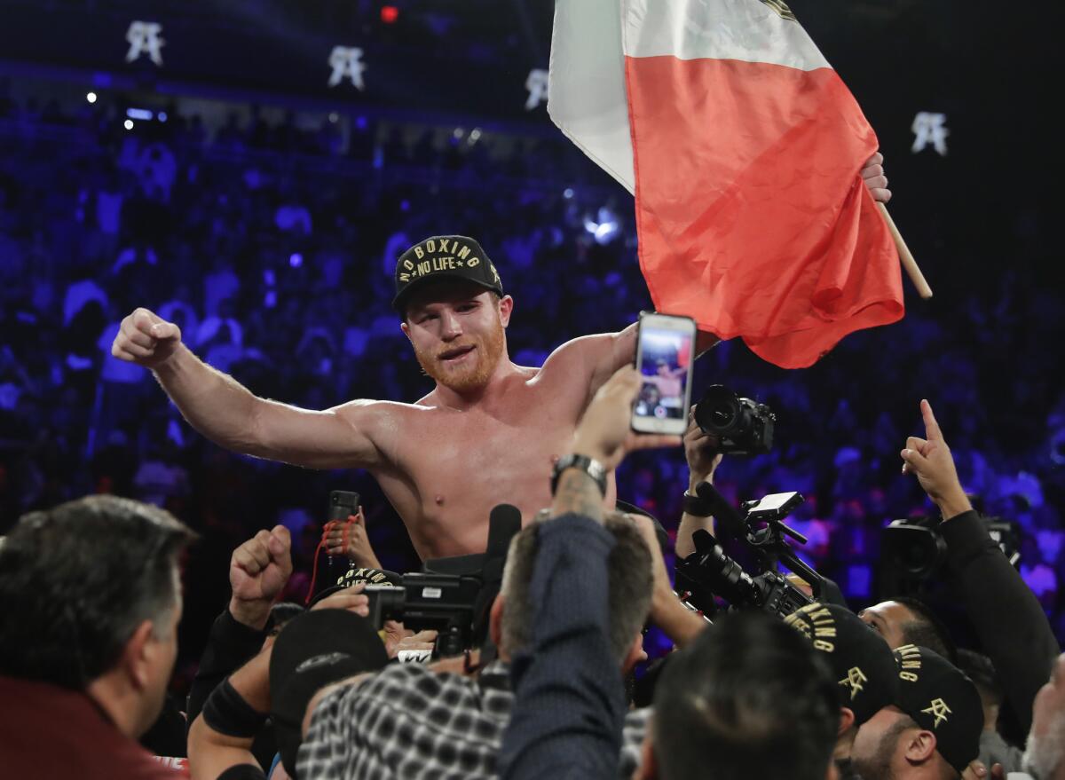 Canelo Alvarez celebrates after defeating Gennady Golovkin.