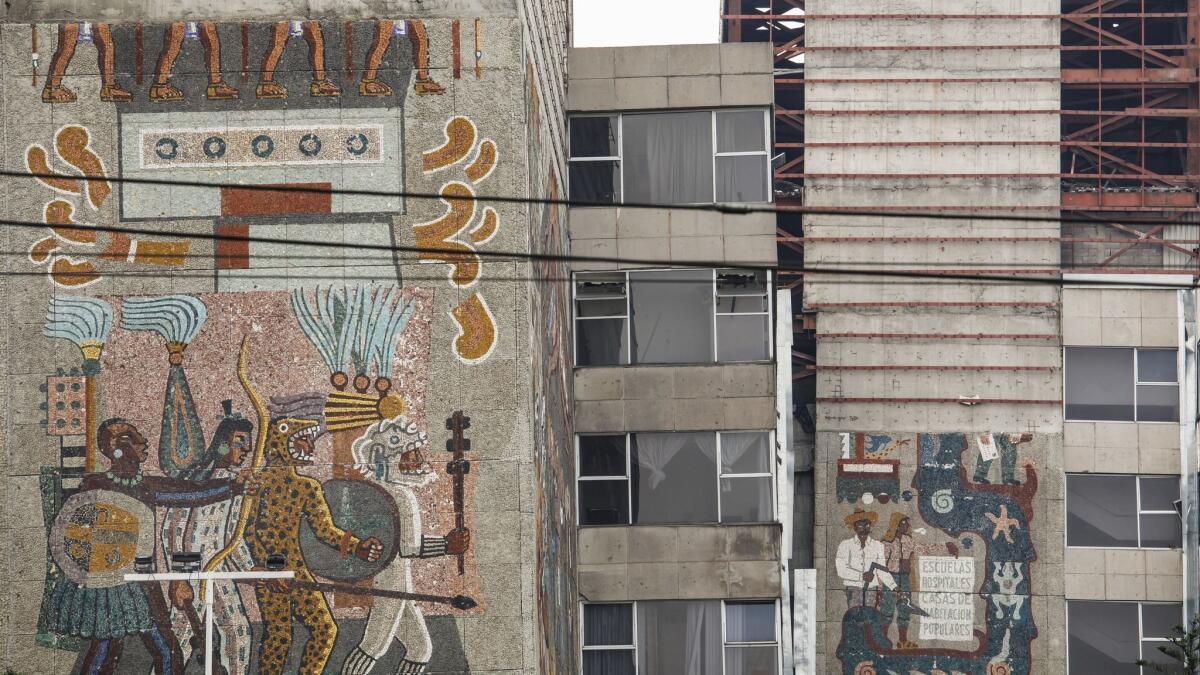 A view of the Centro SCOP murals at the abandoned headquarters after it was damaged twice in separate earthquakes.