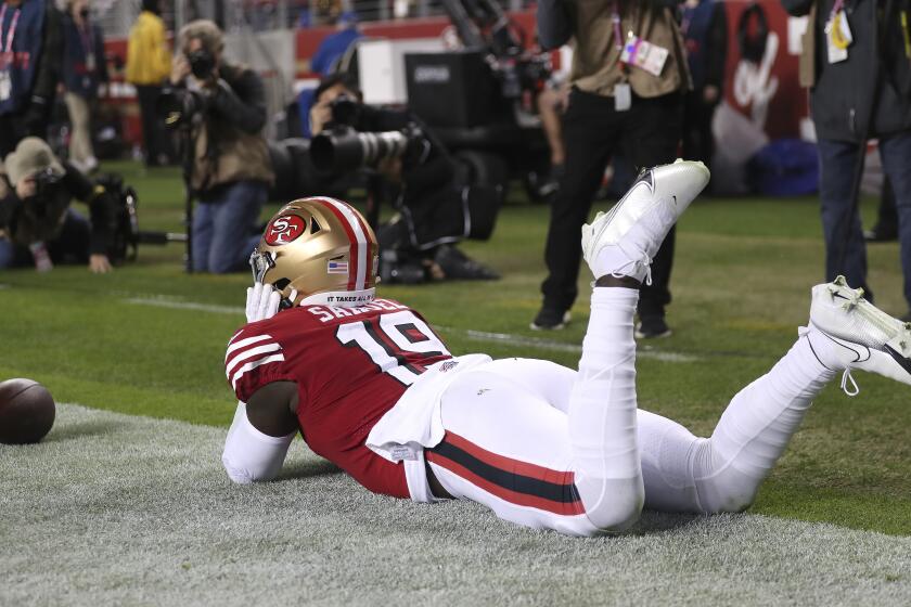 San Francisco 49ers wide receiver Deebo Samuel celebrates after scoring against the Los Angeles Rams during an NFL football game in Santa Clara, Calif., Monday, Nov. 15, 2021. (AP Photo/Jed Jacobsohn)