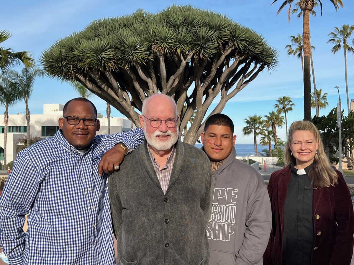 Father Greg Boyle of Homeboy Industries (center), former gang members Chris (left) and Gregorio and the Rev. Rebecca Dinovo