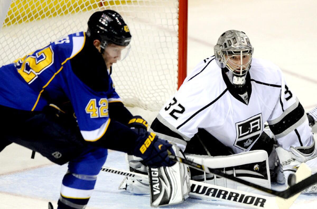 Kings goalie Jonathan Quick blocks a shot by St. Louis' David Backes in the third period of Game 1 on Tuesday night in St. Louis.