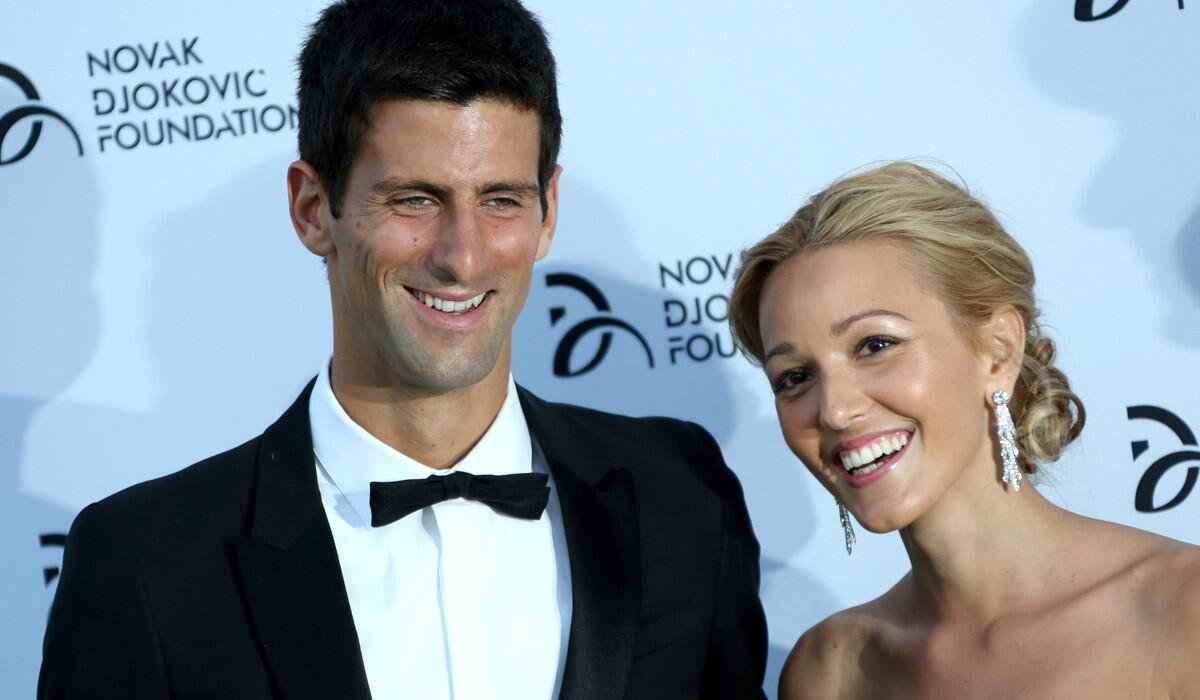 Novak Djokovic and Jelena Ristic arrive at a London fundraiser for their Novak Djokovic Foundation on Tuesday.