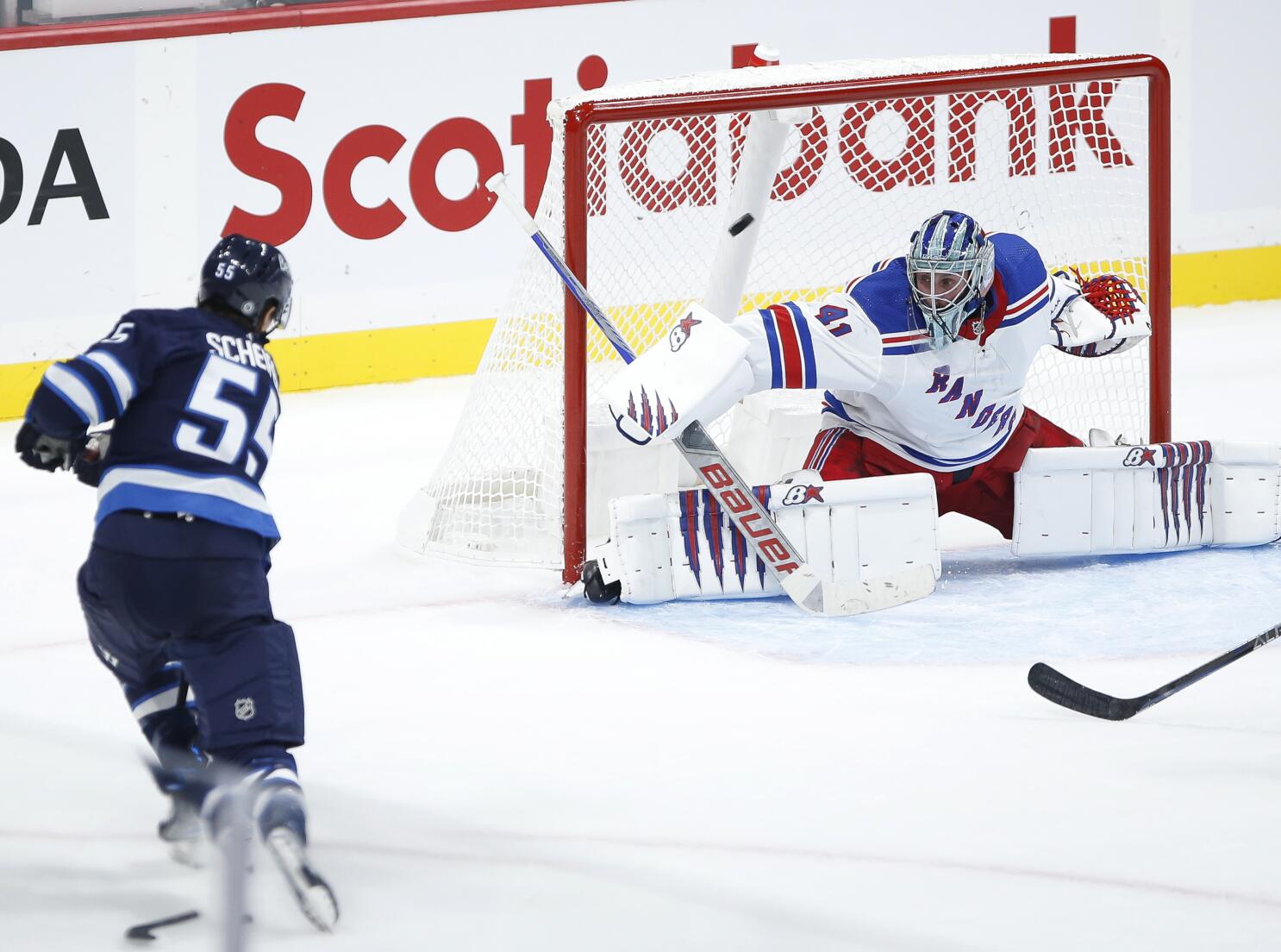 Scheifele scores twice as Jets beat Rangers in season opener