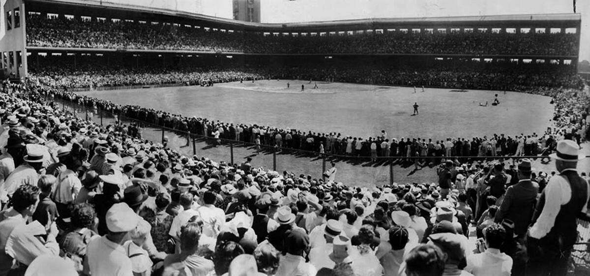30,000 fans crowd the 22,000-seat Wrigley Field for a celebrity charity baseball game for Mt. Sinai Hospital.  July 17, 1937.