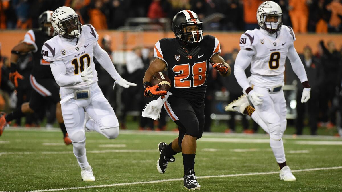 Oregon State running back Terron Ward scores on a 66-yard touchdown run during the Beavers' 35-27 upset victory over Arizona State on Saturday night.