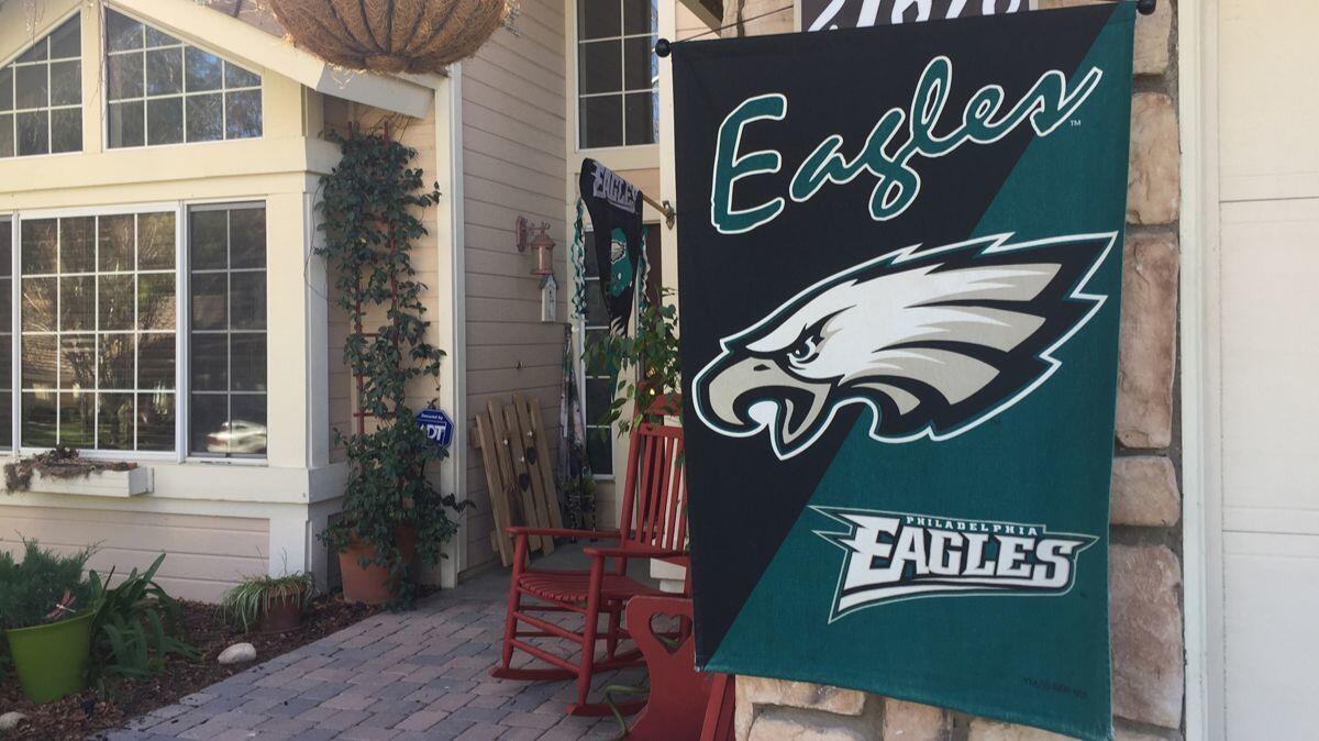 The front of Athan Atsales' house has an Eagles banner and flag.