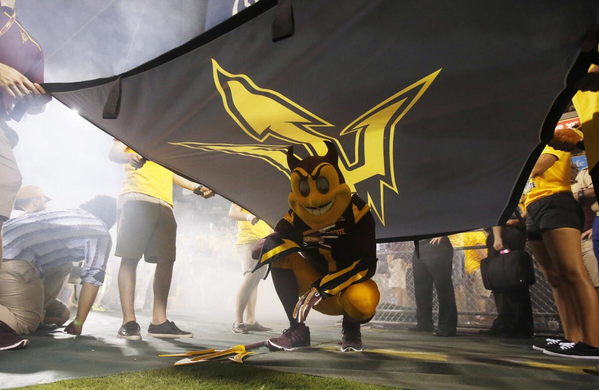 Arizona State mascot Sparky waits to head out onto the field before a game against Cal Poly on Sept. 12.