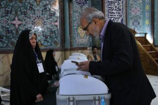 An Iranian man votes for the parliamentary runoff elections at a polling station in Tehran, Iran, Friday, May 10, 2024. Iranians voted Friday in a runoff election for the remaining seats in the country's parliament after hard-line politicians dominated March balloting. (AP Photo/Vahid Salemi)