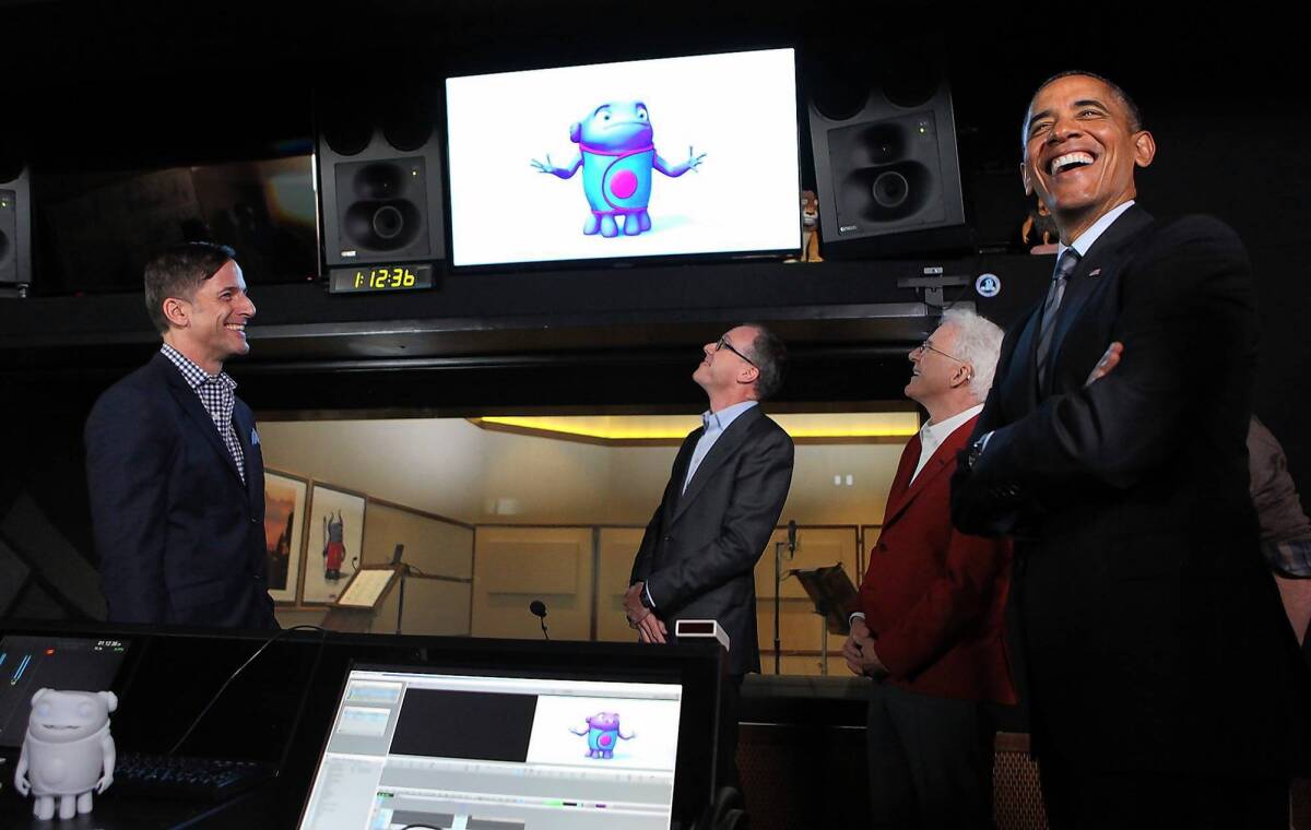 President Obama shares a laugh with, from left, Bill Damaschke, Tim Johnson and Steve Martin during a break from work on DreamWorks' upcoming alien-invasion film, “Home.”