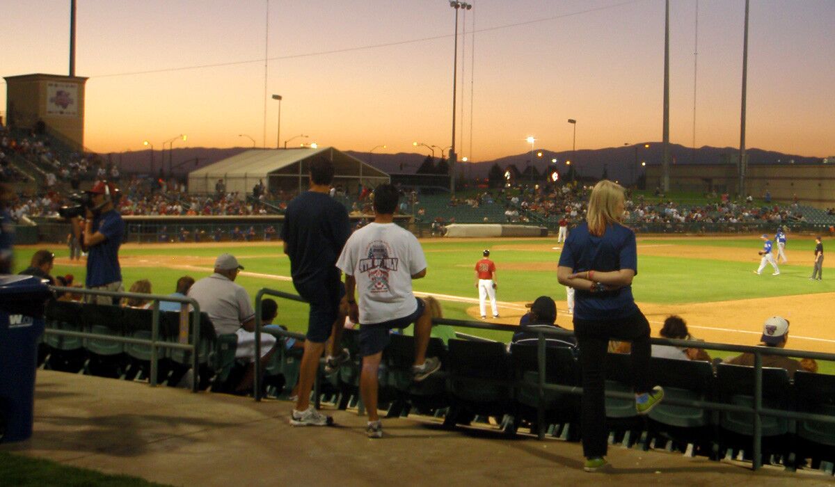Baseball fans take in a game at the Hangar in Lancaster, home to the California League's JetHawks.